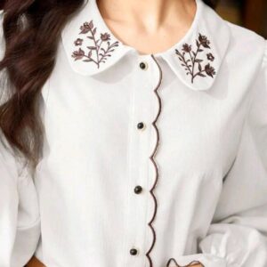 IMG_20260821_174511_692 قميص ابيض انسيابي بياخه مطرزة تطريز بارز